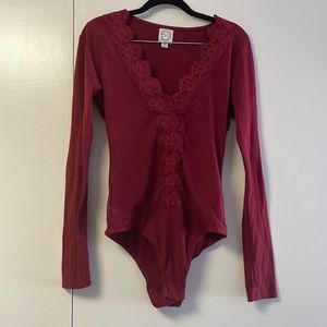 Size M deep v maroon bodysuit